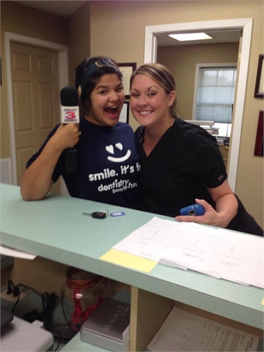 Amicable front desk staff at family dentistry Smile Dental Center