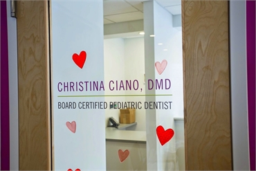 Signage on the door of our pediatric dentist Dr. Christina Ciano's office in Princeton NJ 08540