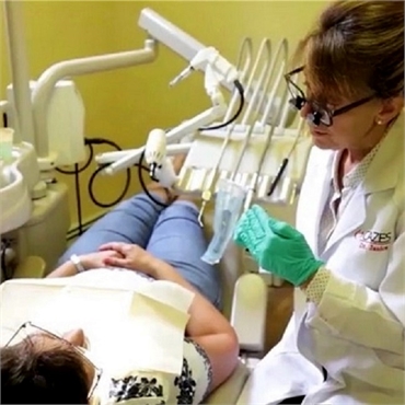 Long Valley dentist Dr. Janice Cazes at work at  Cazes Family Dentistry LLC