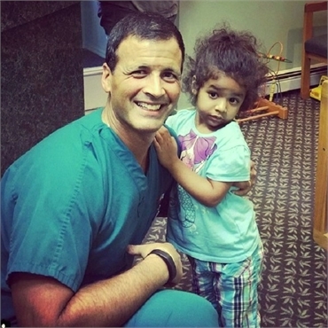 Long Valley dentist Dr. Jay Cazes shares lighter moments with happy patient at Cazes Family Dentistr