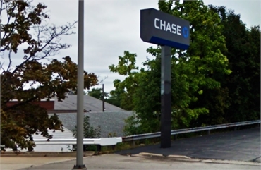 Chase Bank and ATM on 1805 Brittain Rd located just a few paces away to the north of Chapel Hill Den