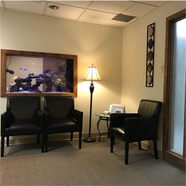 Waiting area and acquarium at Denver dentist Hampden Family Dental Denver CO 80224