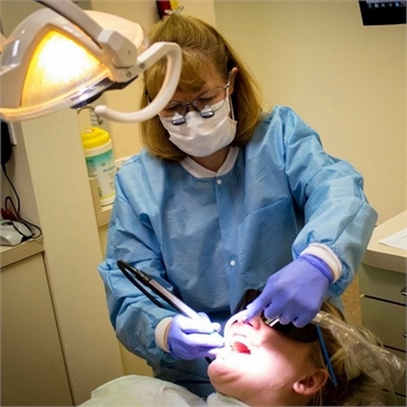 Dental hygienist at work at Ridgeview Dental Centennial CO