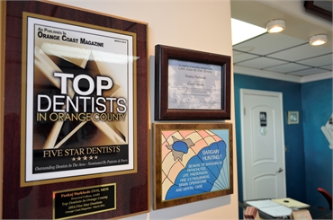 Accolades on the wall at Lake Forest dentist 