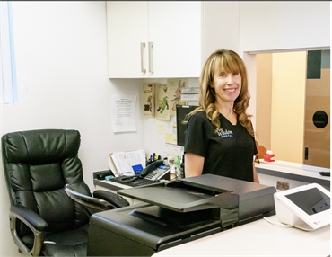 Warm and friendly front desk staff at Coral Springs dentist Wisdom Dental