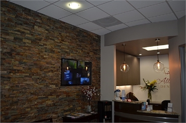 Reception area and multimedia section at San Marcos dentist Allred Dental