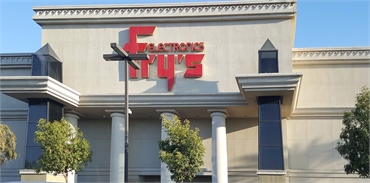 Fry's Electronics a few paces to the east of San Marcos dentist Allred Dental