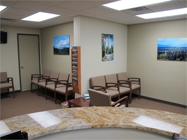 View of the waiting area from the front desk at implant dentistry Bancroft Family Dental Aurora
