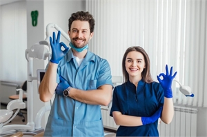 Dentists giving an OK sign