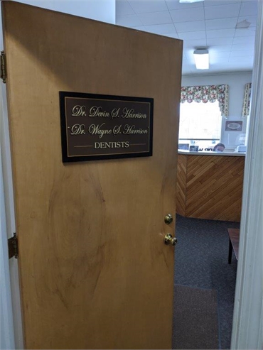 Entrance door and reception area at Gloversville dentist Harrison Family Dentists