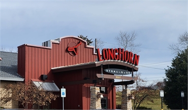 LongHorn Steakhouse at 6 minutes drive to the south of Germantown dentist New Life Dental