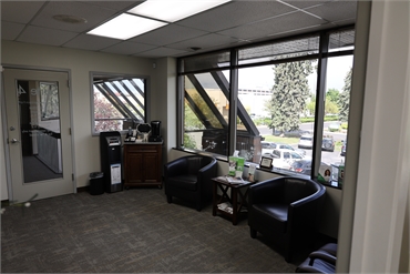 Entrance door and waiting area at Serenity Dental