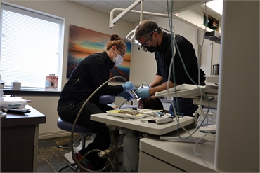 Spokane dentist Dr. Welton working on dental implant patient at Serenity Dental