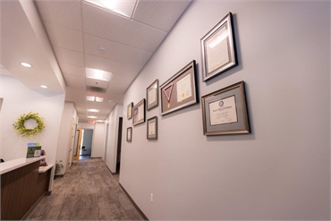 Hallway and award display at Pine Hills Dentistry Grass Valley