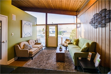 Bright and cozy waiting area at Edgewater Dental Arts in Edgewater