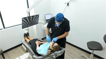 Denver dentist Dr Katanov performing root canal at Diamond Dental Group