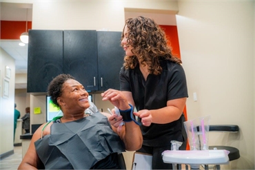 Patient consultation and prep for dentures at 10 Day Smiles in Coppell TX