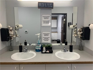 Brushing and flossing station at Comfort Dental Kids - Aurora