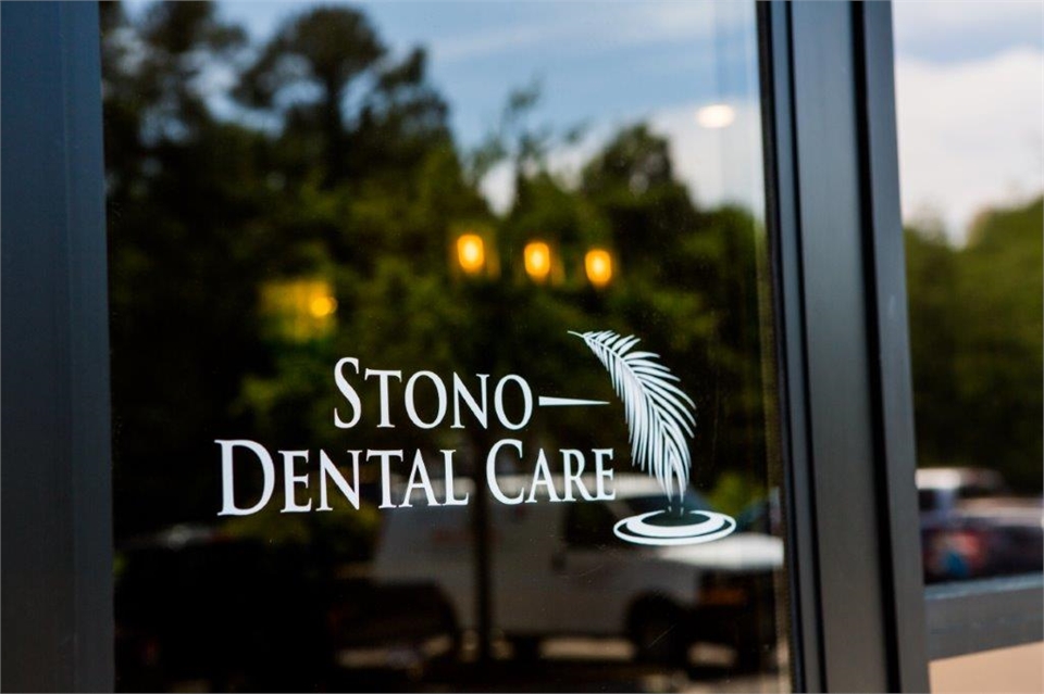 Signage on the glass door at Johns Island dentist Stono Dental Care