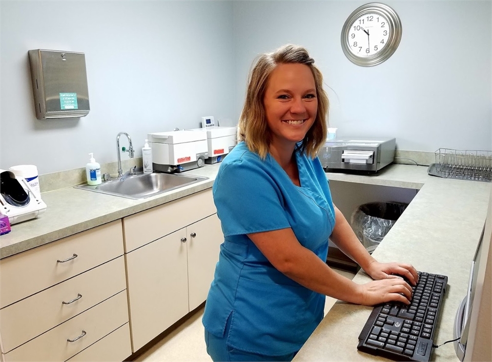 Dental hygienist in sterilization area at Elkhart dentist Douglas J Snyder DDS PC