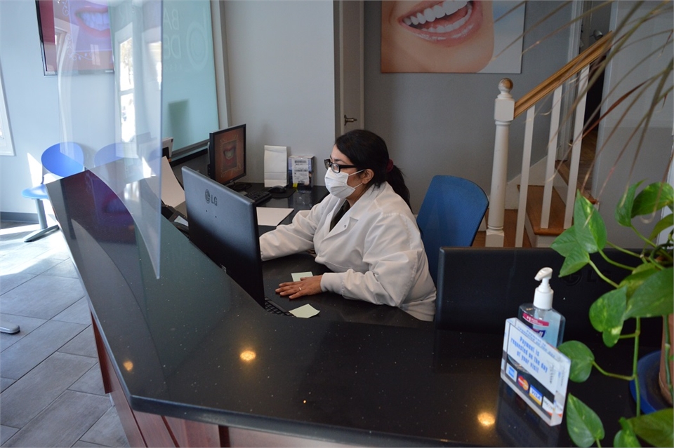 Front desk staff at Elizabeth dentist Banker Dental Associates