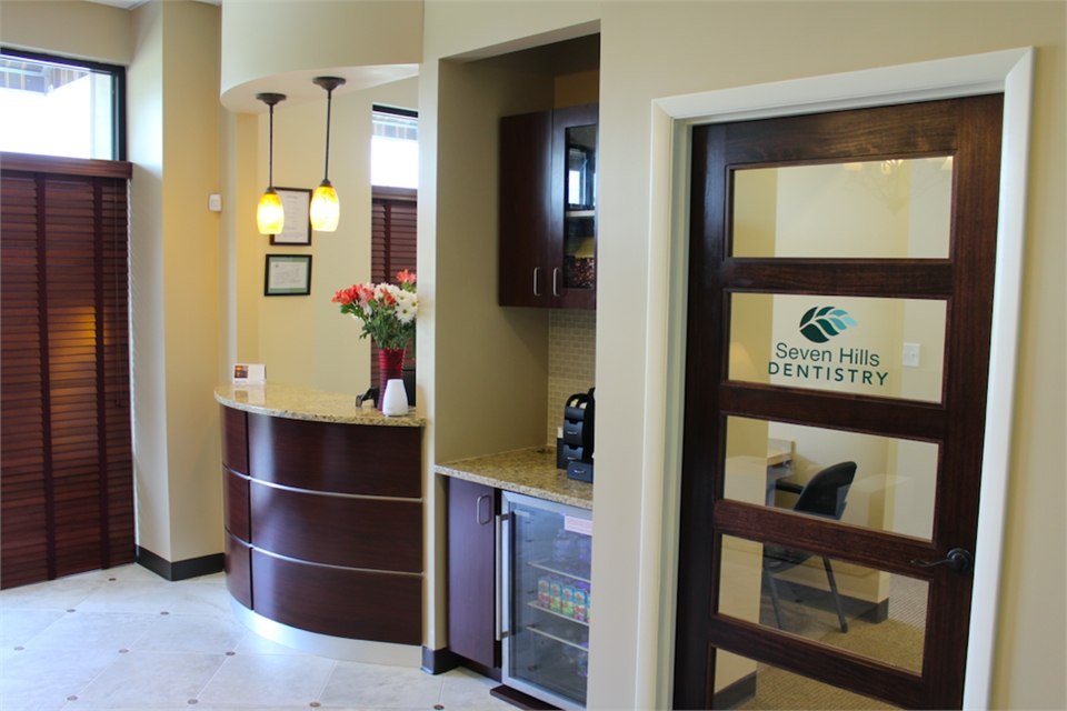 Reception desk and refreshment station at Dallas dentist Seven Hills Dentistry