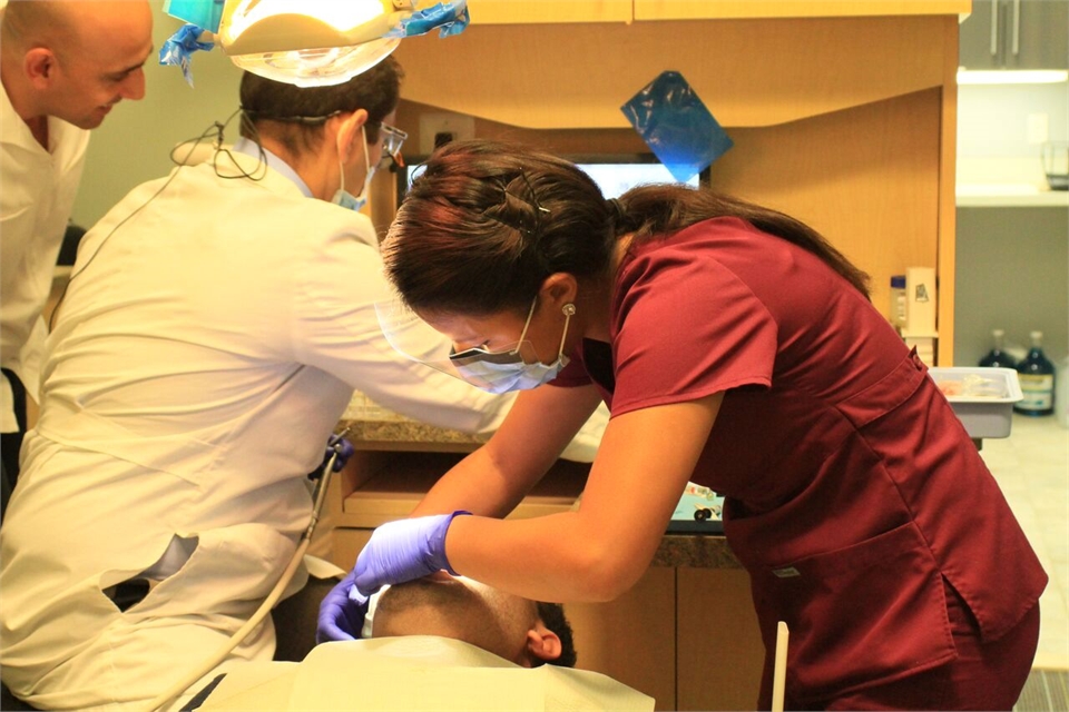 Dental hygienist at work at Potomac Family Dental Woodbridge VA