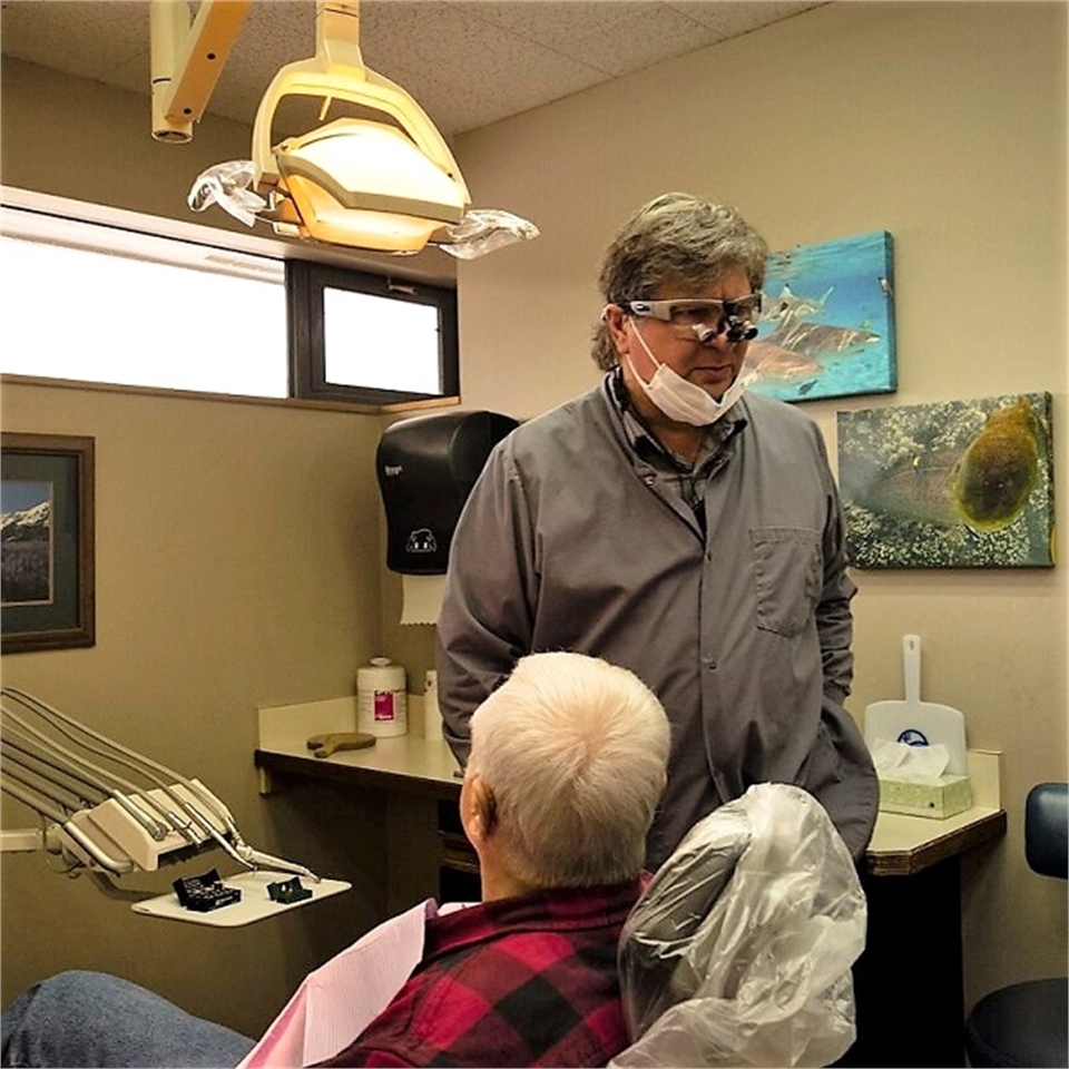 Dr. Jason Keefe patiently listens to patient concerns