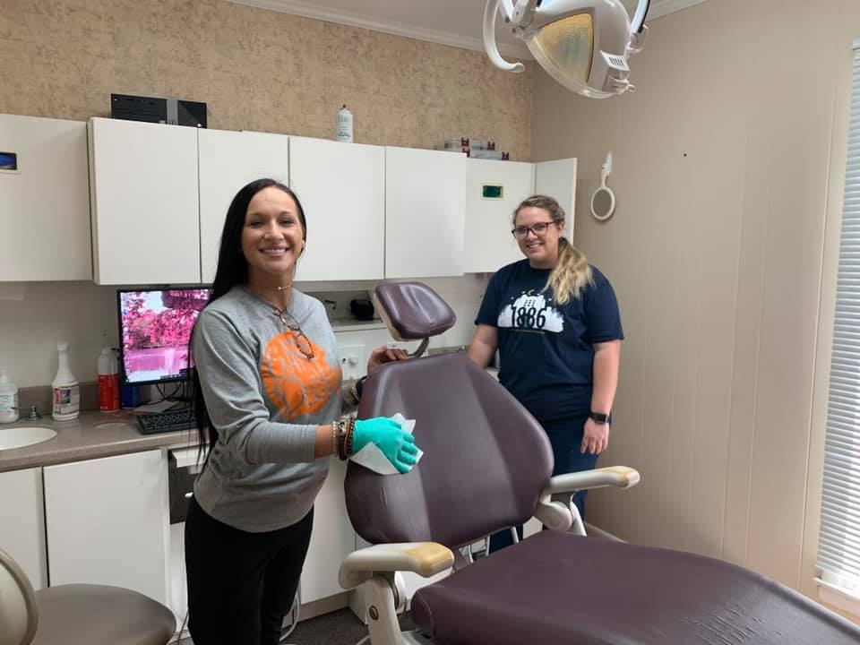 Dental hygienists preparing for dental implants procedure