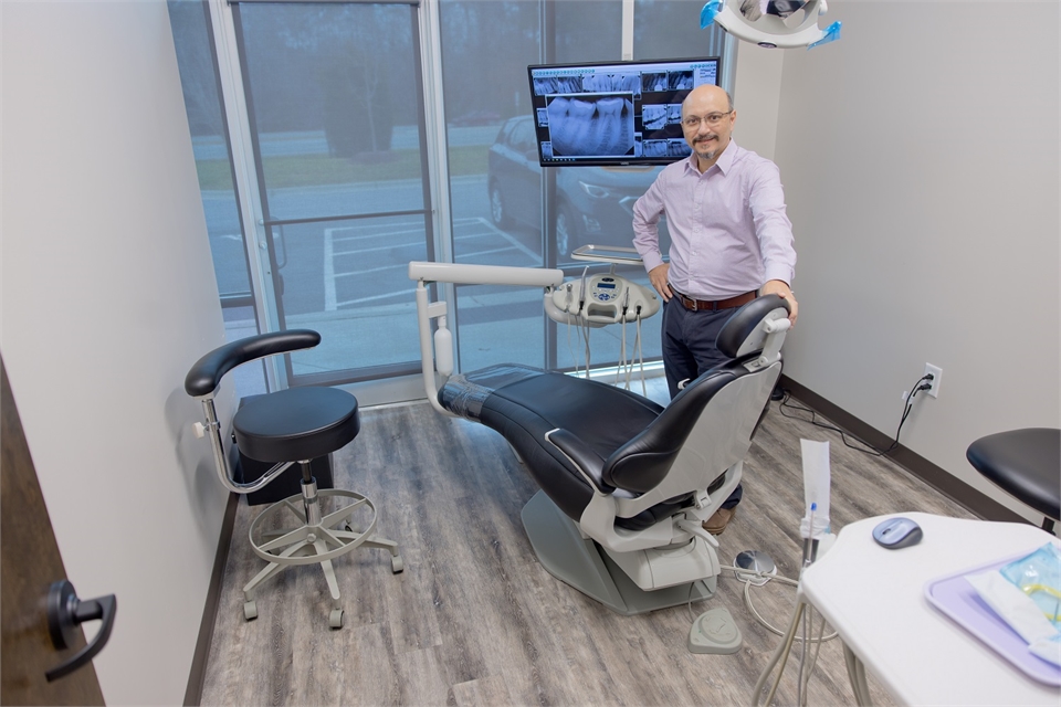 Chapel Hill dentist Dr. Mistry in the state of the art operatory at Everbright Dental