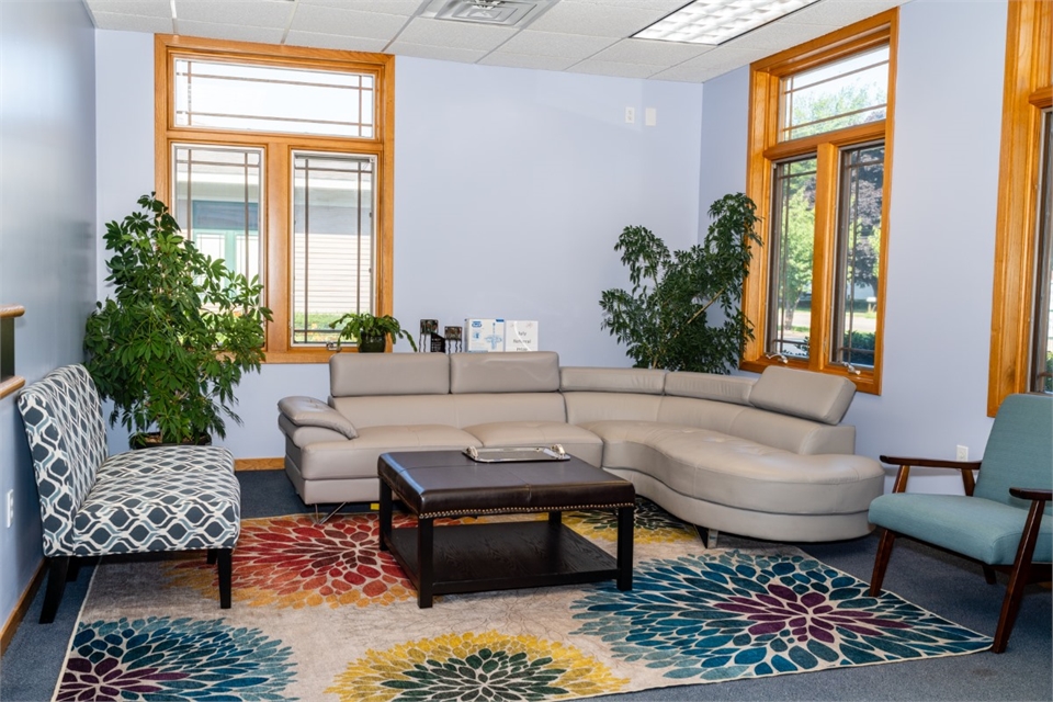 Spacious and well lighted waiting area at Grand Haven Dental Care