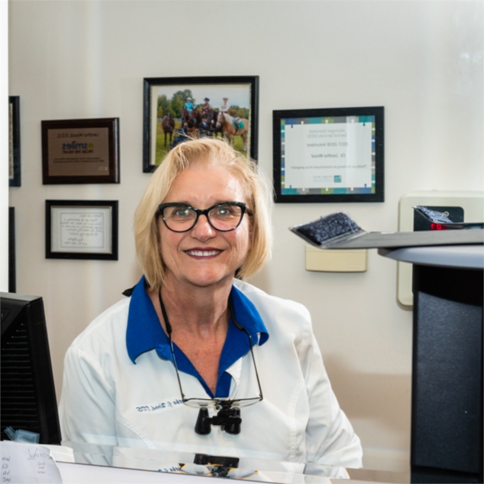 Dr. Leatha Wood in her consulting room at Grand Haven Dental Care