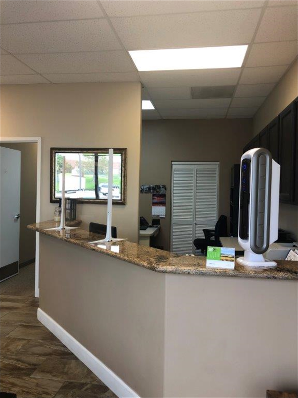 Plexiglass installed at the reception area at Centennial dentist Ridgeview Dental