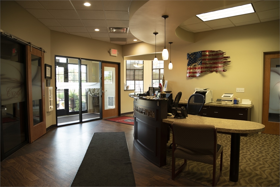 Reception desk and entrance to Milwaukee dentist Cigno Family Dental