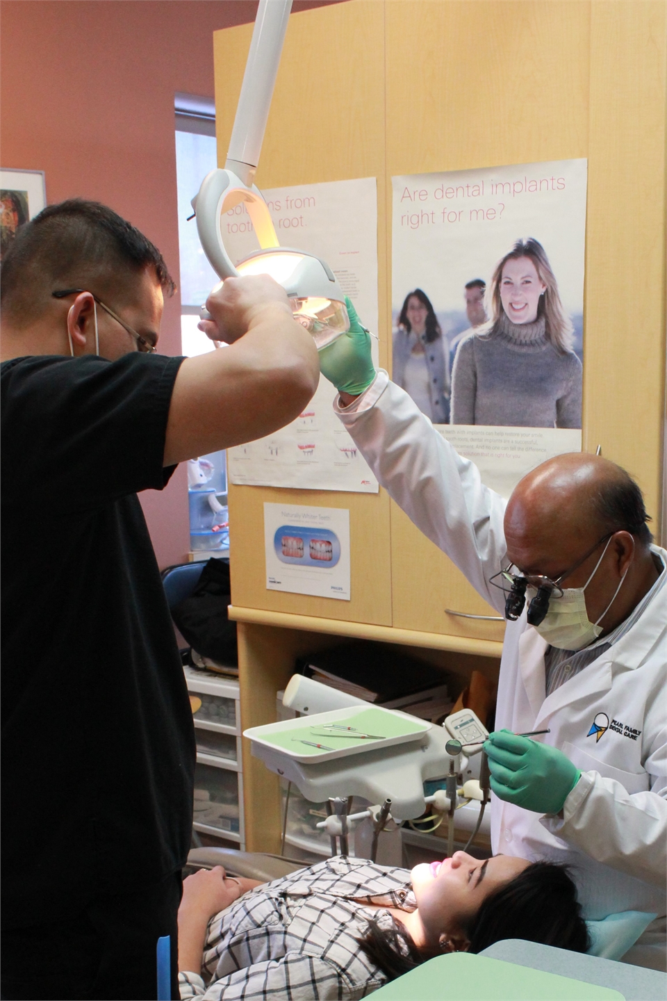 Winnipeg Invisalign specialist Dr Tom Colina at work at Integral Dental