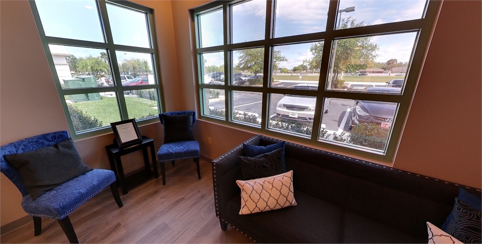 Comfy waiting area with outside view at New Port Richey dentist A Glamorous Smile