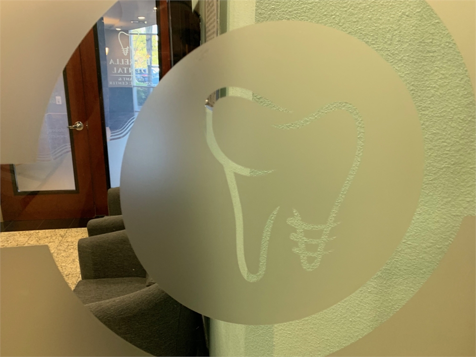 Logo on the entrance door at Chula Vista Estrella Dental