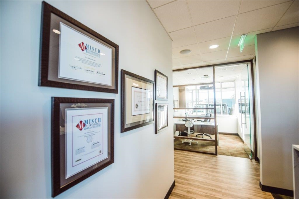 Award display wall at Corson Dentistry Parker