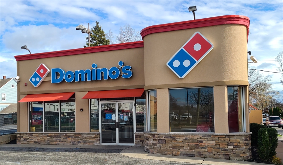 Domino's Pizza at 1 minute drive to the southwest of Dumont dentist East Madison Dental