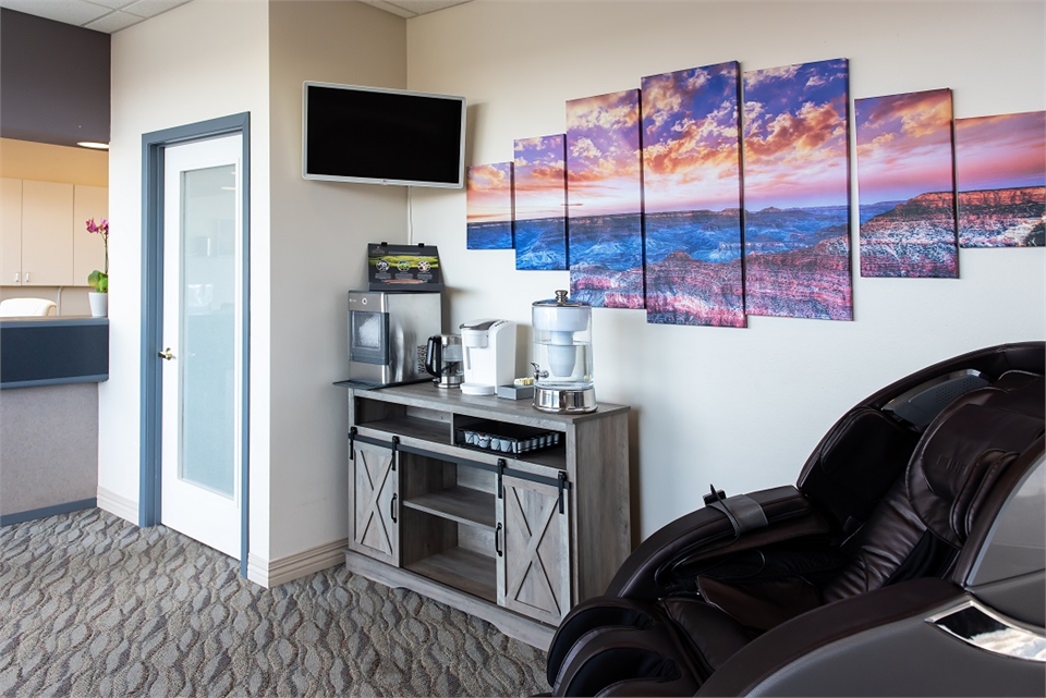 Massage chair and refreshment station at Serenity Dental