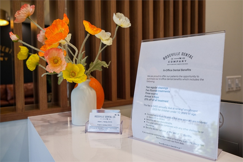 Front Desk Display and In-Office Dental Benefits Sign at Roseville Dental Company