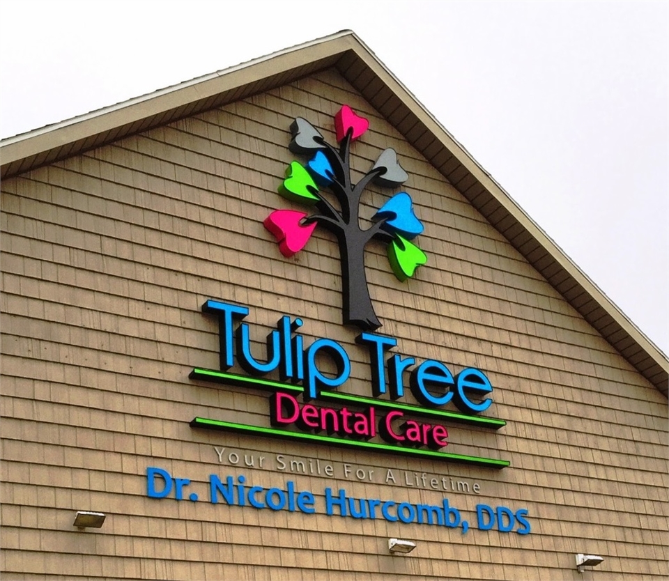 Signage on the building at South Bend dentist Tulip Tree Dental Care