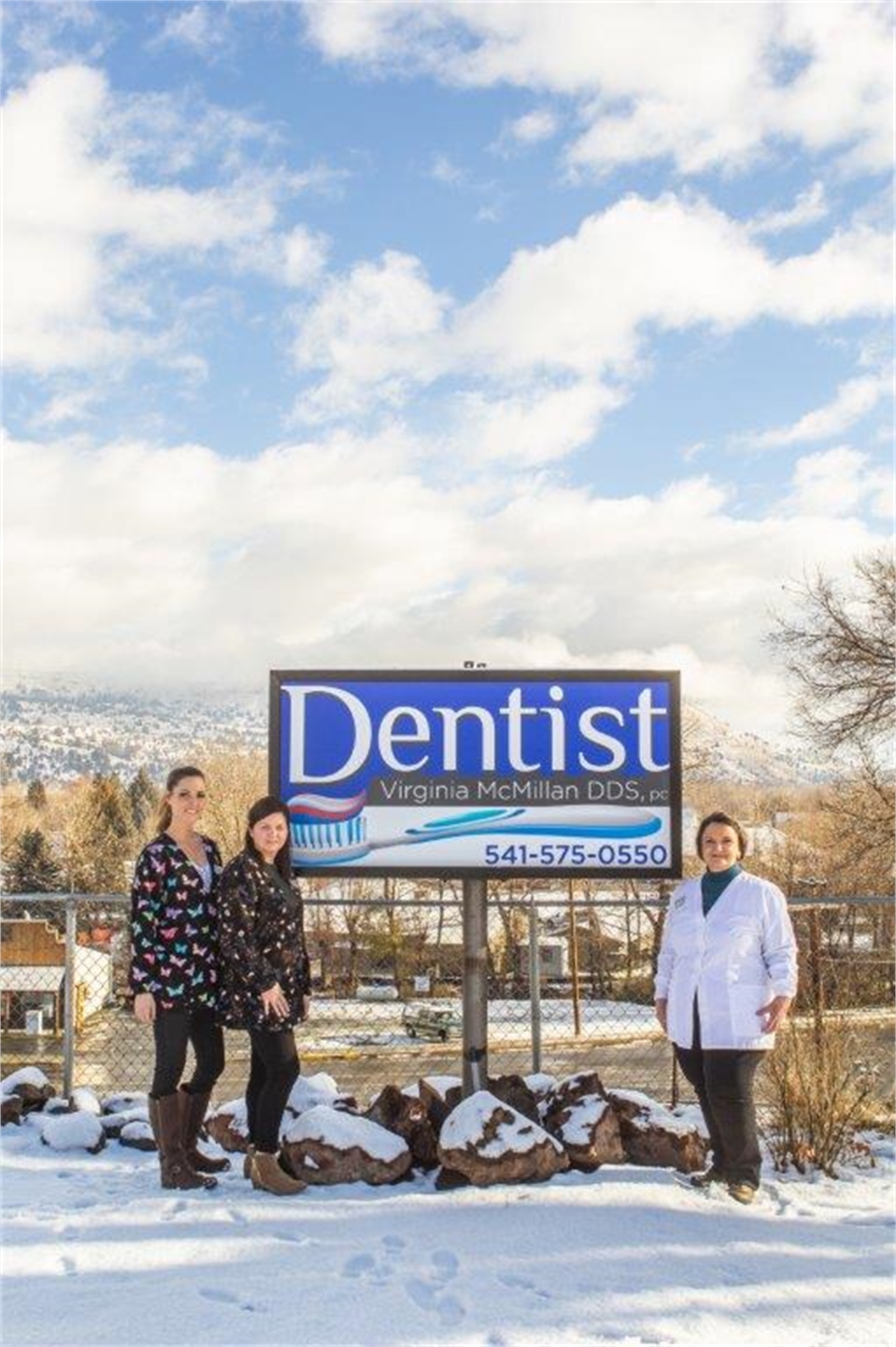 Outdoors signboard at John Day dentist John Day Smiles  