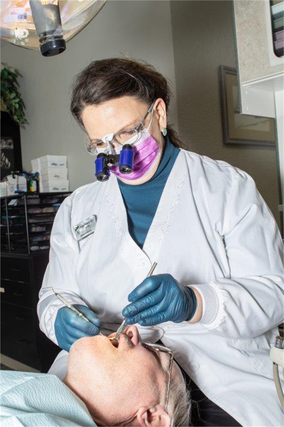 John Day dentist Dr. McMillan performing root canal patient at John Day Smiles 