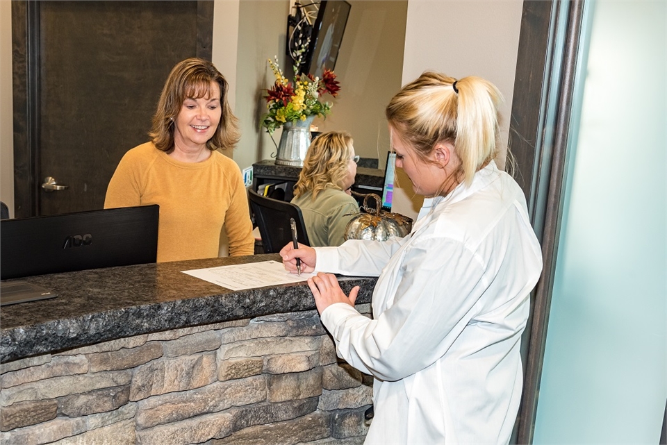 Treatment planning at checkout area at Best Impression Dental Dr. Alicia G. Burton DDS