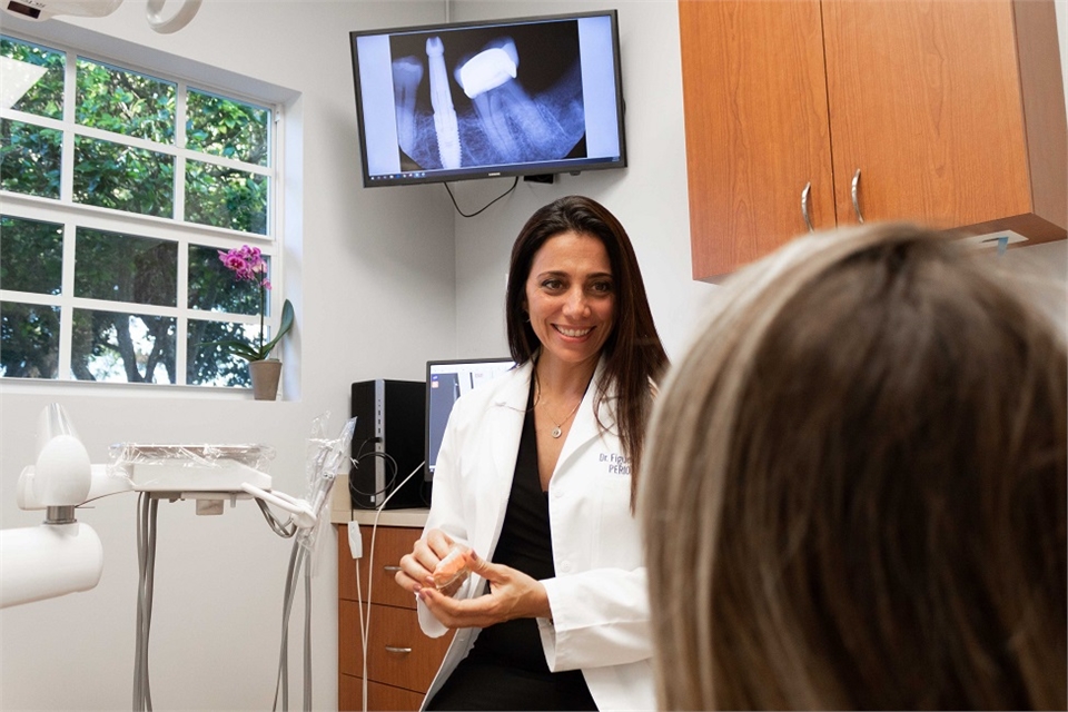 Davie dentist Dr Cohen with patient at One Dental Studio