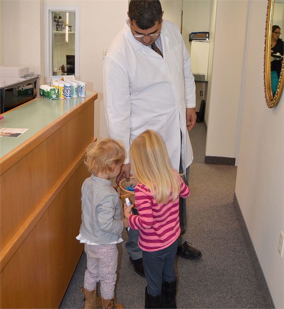 Hadley MA dentist Dr. Gogjini sharing lighter moments with kids