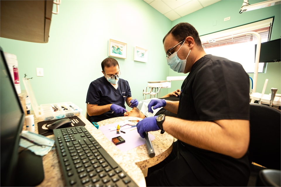 Dr. Behzad Sanei performing root canal at Advanced Dentistry at Morton Grove