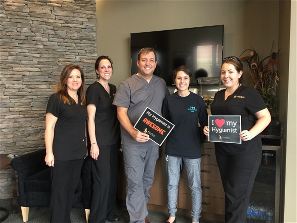 Columbia SC dentist Dr Griffin with hygienist team at WildeWood Aesthetic Dentistry