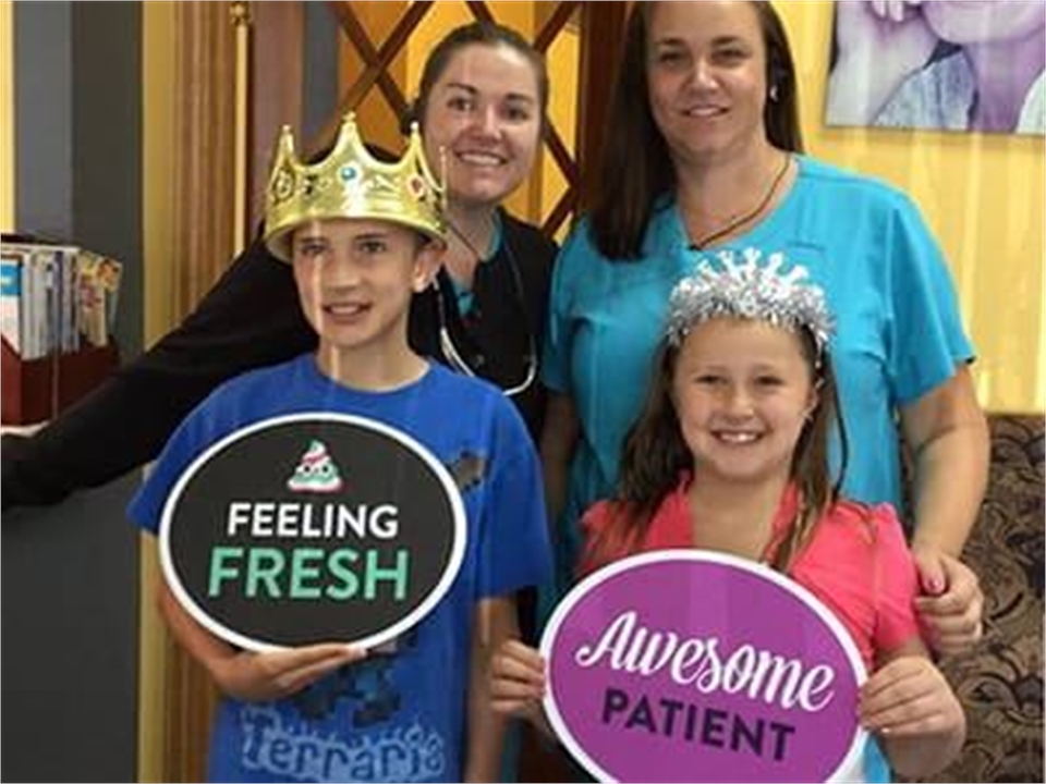 Longmont CO dentist Artistic Smiles team with patients